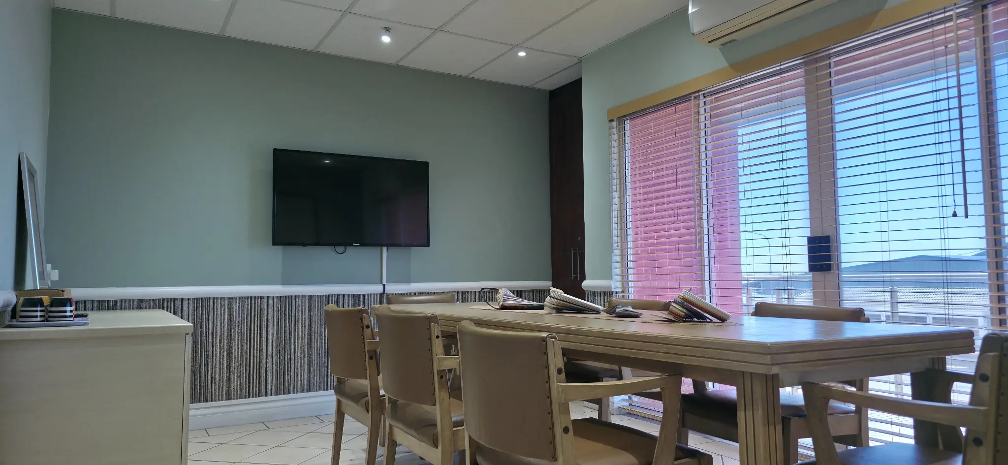 The boardroom — Our boardroom, with blind samples ready to compare and space to discuss your project.