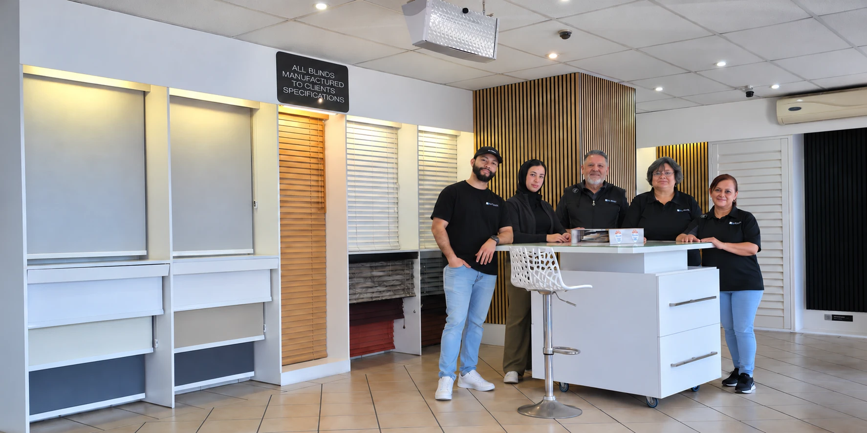 The PE Blinds team welcoming visitors in the showroom